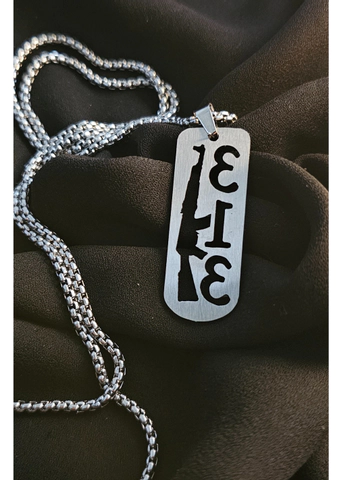 پلاک و زنجیر 313 و تفنگ